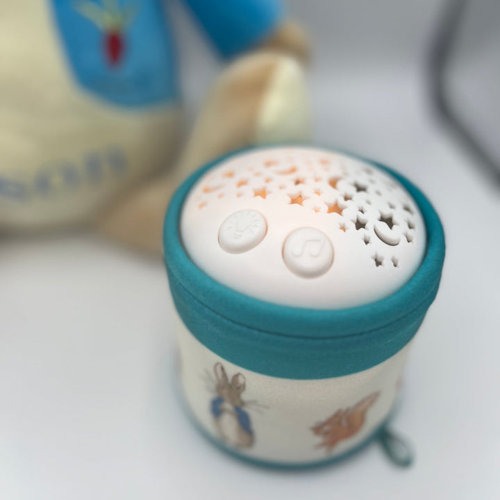 Bedtime cuddles toy — Peter Rabbit nightlight projecting stars on ceiling