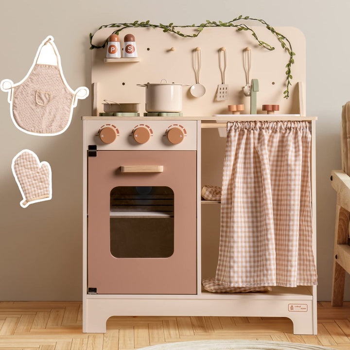 Rustic Wooden Kitchen with Cooking Utensils, Pans, Apron, Gloves and Leaf Light String - Chic Petit