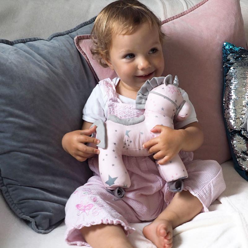 2-in-1 unicorn toy that transforms from pull-along to cuddly plush