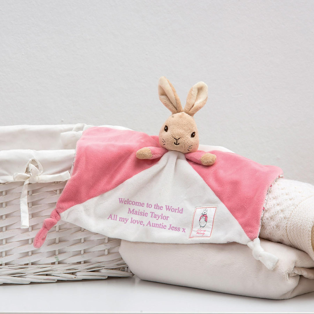 Personalised Beatrix Potter comfort blanket with name beside logo